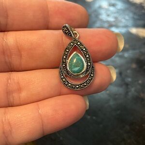 Silver tone teardrop pendant